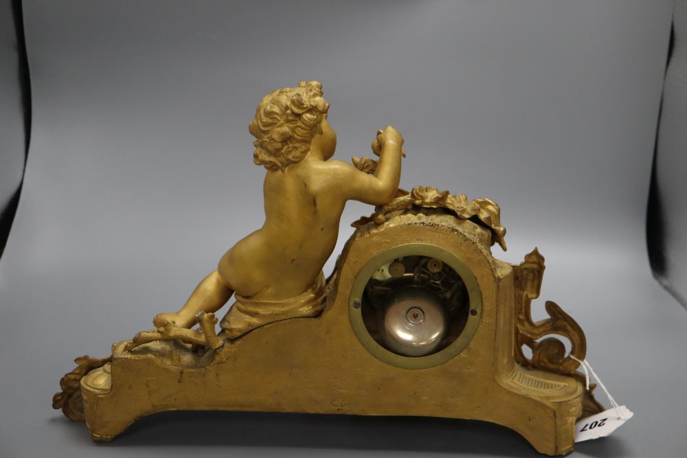 A French gilt spelter figural mantel clock, with Sevres style plaque, height 26cm